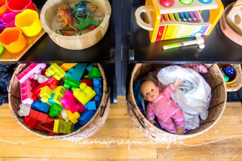 basket with baby dolls and blocks