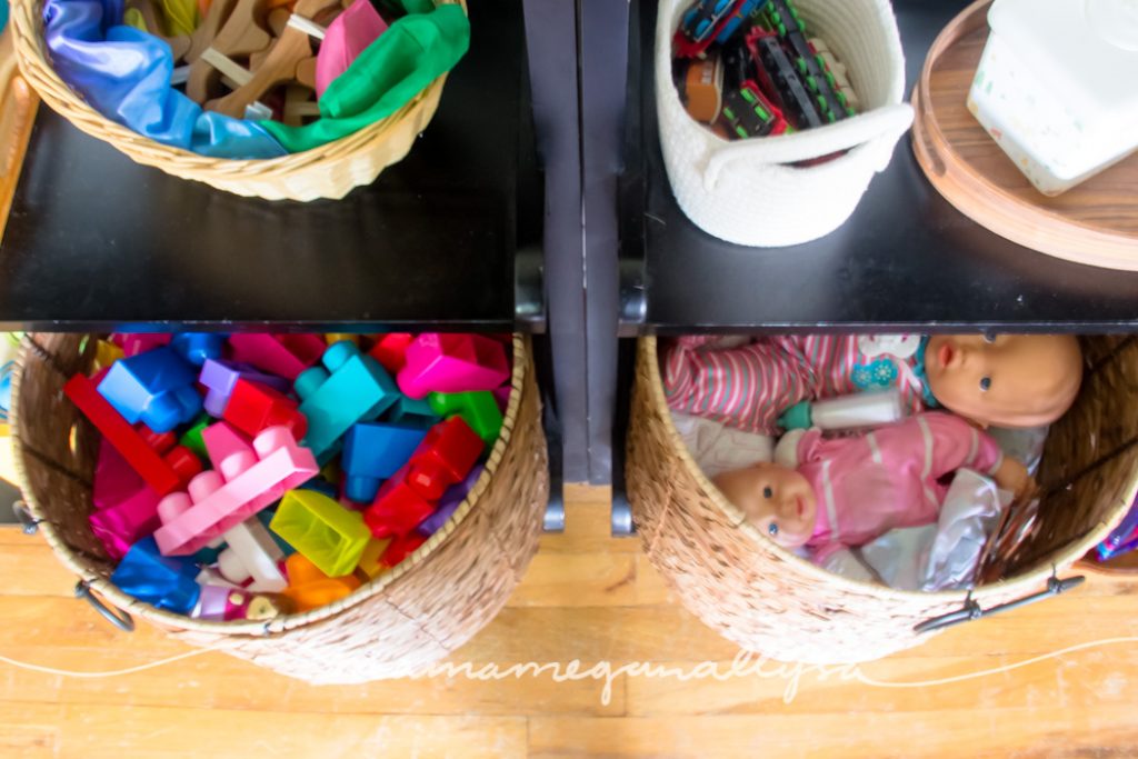 Our big baskets with her building blocks and baby dolls