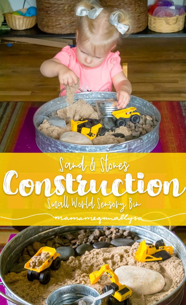 A Kinetic Sand and Construction truck themed sensory bin set up