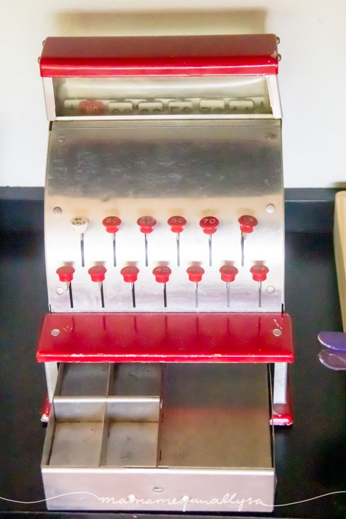 her red and silver vintage metal cash register