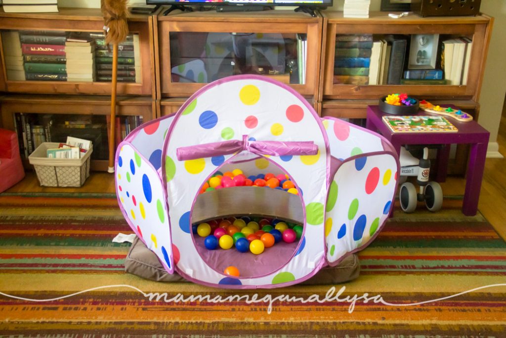 a ball pit in the middle of the living room