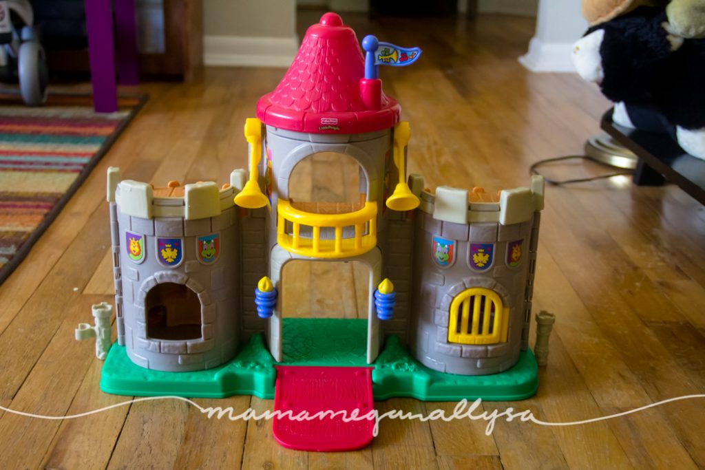 Her favortie toy this week ; a Little People Castle and Rapunzel Little People Figures