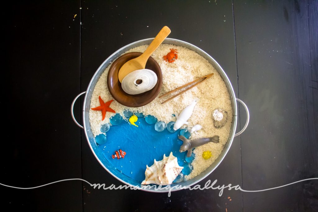 I pulled our beach themed rice sensory bin together using all items that we already owned