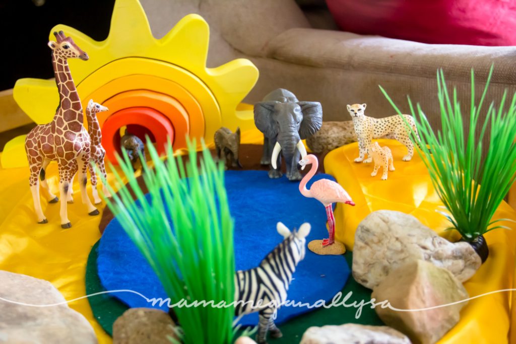 She has loved matching mama and baby with our plastic animals this week on our African savanna small world