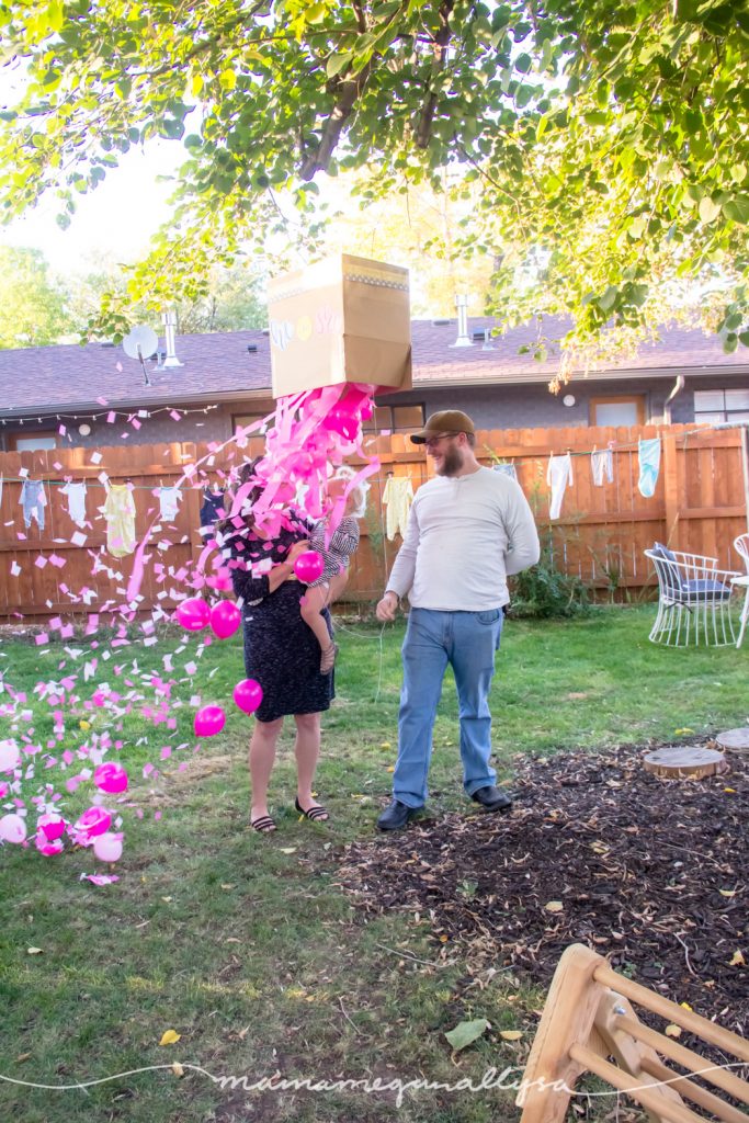 pink streams, balloons and confetti falling out of our gender reveal box