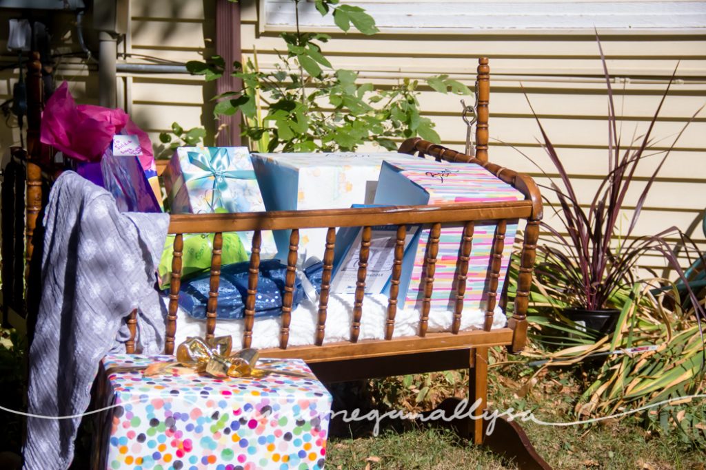 a vintage baby cradle to hold any gifts for baby Bean. Mostly it was diapers, which is just what we needed!