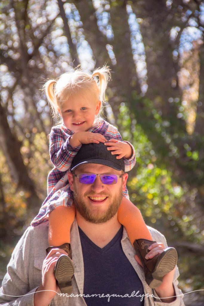 Riding on your daddy's sholders is even better when your daddy is so tall!