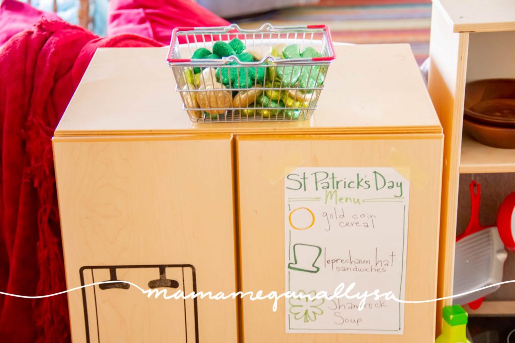 Part of our St. Patrick's Day Toy Rotation is a St. Patricks day menu and some decor used as loose parts for cooking in her play kitchen