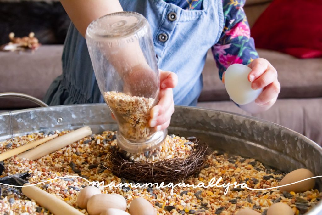 The addition of the milk bottle allows for practice filling and dumping as well as imaginative play