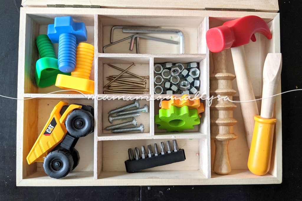 a construction tool themed play dough tray