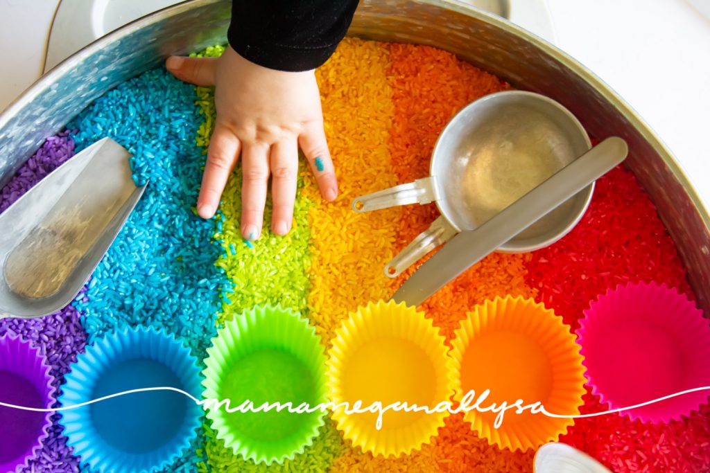 Rainbow rice is so beautiful that its hard for  kids to keep their hands out of it!