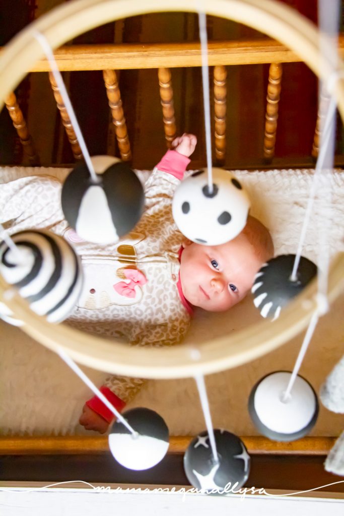 a high contrast mobile is a great addition to your newborn playtime. the bold patterns help develop their eyesight and tracking