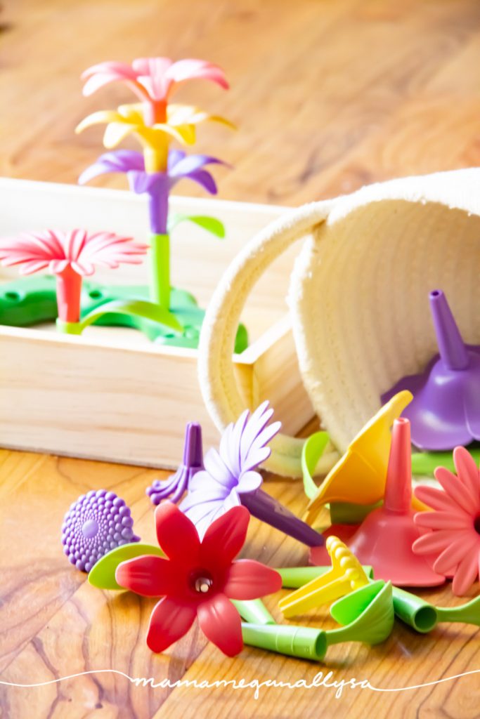 green toys build a bouquet is a great fine motor toy and also a fun invitation to build as we can mix and match the flowers however we want