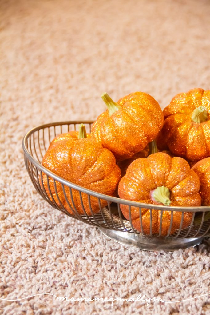 glitter pumpkins as both decor and loose parts play for both girls