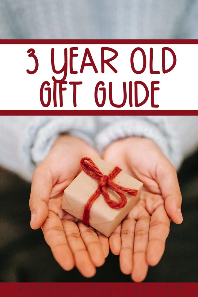 a pin image that reads 3 year old gift guide showing a person holding a small brown paper wrapped package with red string ribbon