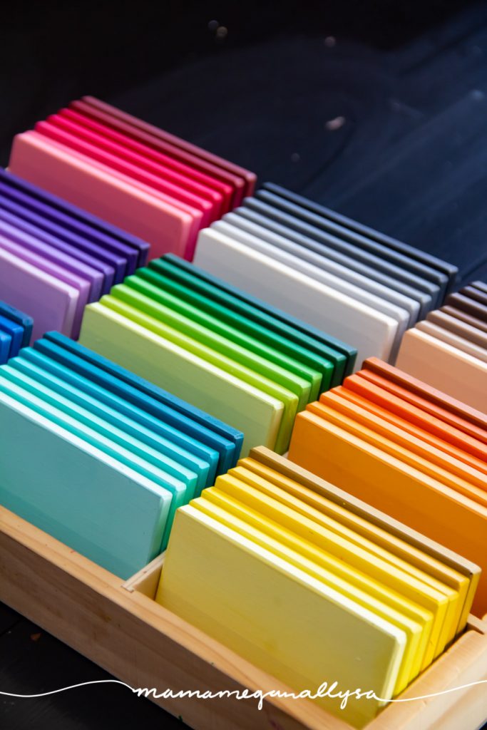 DIY Montessori color tablets neatly arranged in a wooden divided tray