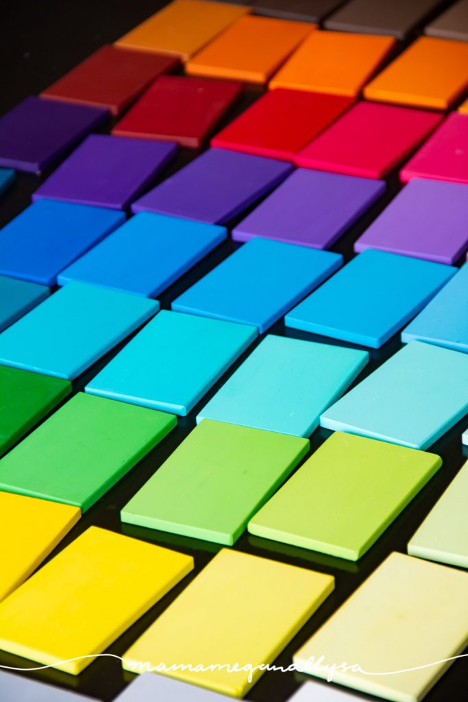 a close up of DIY Montessori color Tablets laid out all together similar to a blanket on a table