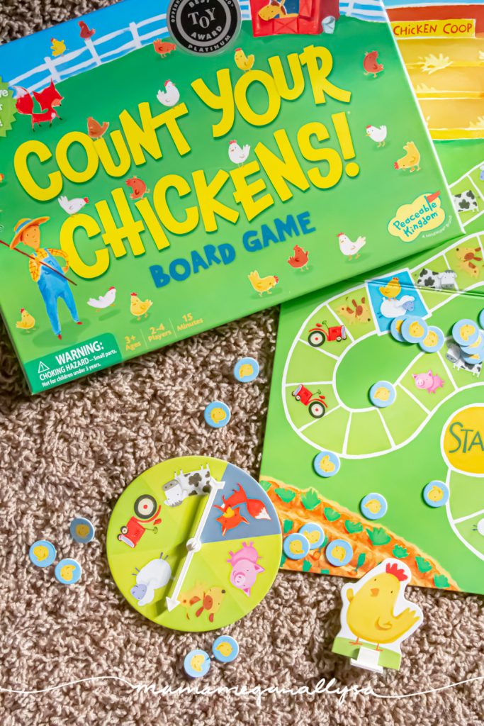 an top down shot of the board game count your chickens with the pieces scattered around it