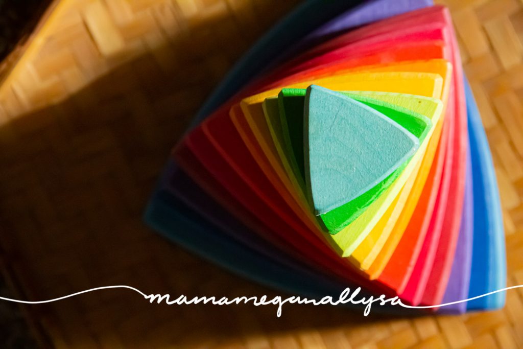 a close up top-down shot of a rainbow Grimms triangle conical tower