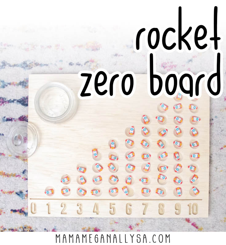 a wooden board that has been carved to have a bunch of circles in it, all those circles have little rocket erasers sitting in them