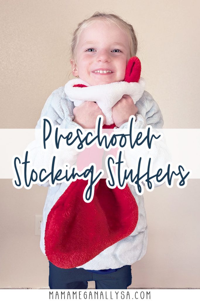 a pin image that reads preschooler stocking stuffers with an image of a blonde preschooler hugging a classic red Christmas Stocking closer to her