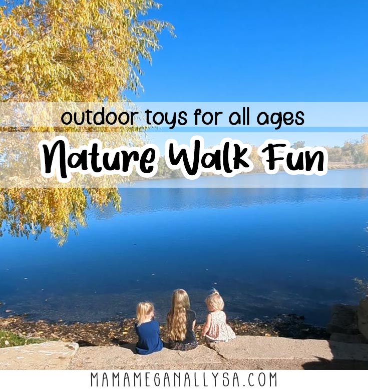 a pin image that reads outdoor toys for all ages, nature walk fun with an image behind the text that shows three little girls sitting at the edge of a lake with a golden fall tree to the left