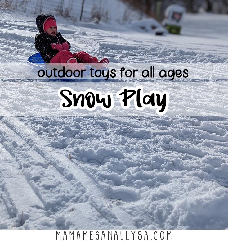 a pin image that reads outdoor toys for all ages, snow play with an images behind the text that shows a preschooler on a blue sled sliding down a hill