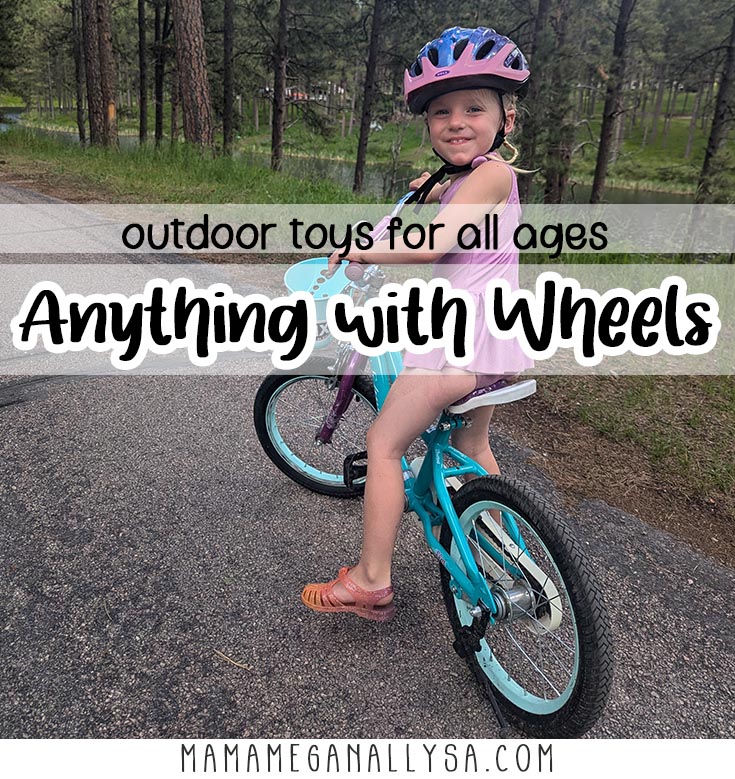 a pin image that reads outdoor toys for all ages, anything with wheels with an image behind that shows a preschooler on a bike looking back over her shoulder at the camera